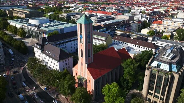 Aerial drone view of St. Markus &ndash; Evangelisch-Lutherische Kirchengemeinde M&uuml;nchen, a prominent Lutheran church located in the heart of Munich, Germany. 