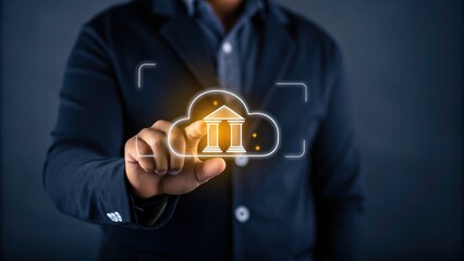 A person in a suit touches a virtual cloud icon with a bank symbol, representing digital banking or financial technology.