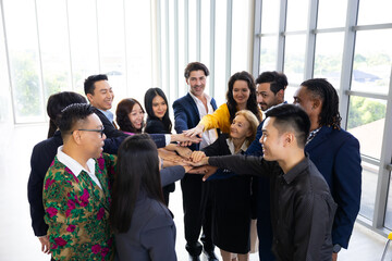 Obraz premium team hands together. Unity and teamwork. Group of business team showing unity with their hands together