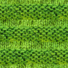 Seamless 4k photo texture material of green colored woven knitted wool sweater.