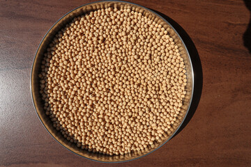 Top view of White dried Peas or Safed matar in plate.