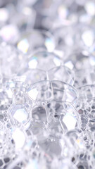 Close-up of Shimmering Bubbles Creating a Sparkling, Translucent Texture Under Soft Light During a Playful Moment