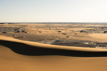  White rock formations and sand dunes in Egypt's White Desert, natural desert landscape