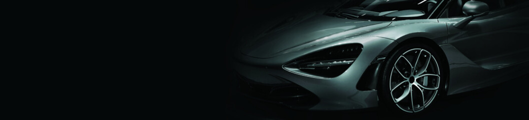 Detail on one of the LED headlights super car.copy space