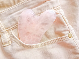 Rose quartz gua sha lifestyle closeup photo
