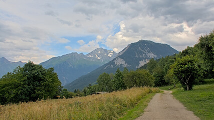 road through a mountain landscape in the french alps