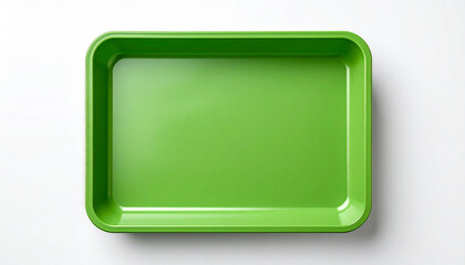 Empty green plastic tray isolated on white backdrop. Top view.