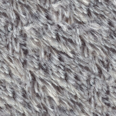 Seamless 4k photo texture of silver gray synthetic fur material.