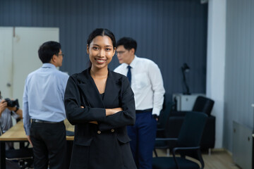 Portrait Asian business woman : Young confident smiling Asian business woman leader, professional entrepreneur company executive ceo manager. Team meeting