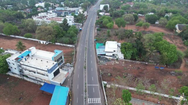 Early morning aerial footage of Tanjore&rsquo;s historic church bathed in golden sunlight, highlighting its architecture and serene surroundings.

