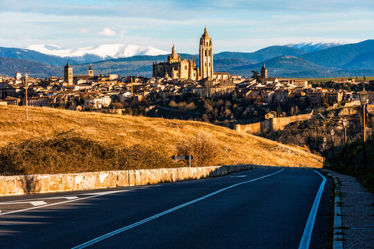 Picturesque view of Segovia skyline with the Guadarrama mountains majestically in the distance.