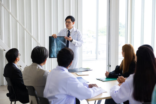 Hospital Medical Research : Group of Doctor, nurse and healthcare professional team meeting sitting in the boardroom,  Planning and brainstorming health