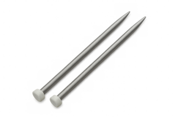 Metallic knitting needles resting on transparent surface, featuring white stoppers for precise handcrafted textile work