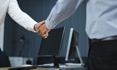 businessman shaking hands on business cooperation agreement. Successful Asian businessmen handshaking after good deal. successful negotiate, hand shake celebration partnership and business deal