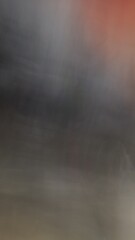 Obraz premium The image is quite blurry and lacks distinct elements, making it difficult to describe in detail. It appears to have muted colors that blend together, creating an abstract and indistinct composition.