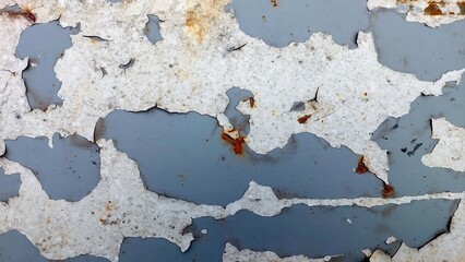 Peeling Paint Texture Revealing Layers of Color and Decay on a Weathered Surface