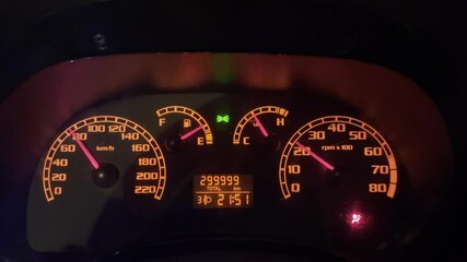 Close-up video capturing the exact moment a car's odometer turns from 299999km to 300000km - a rare automotive milestone