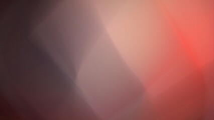 Soft, translucent shapes overlap in shades of red, pink, and purple, forming a dreamy, abstract composition. The delicate gradients and smooth blending create a harmonious visual effect.