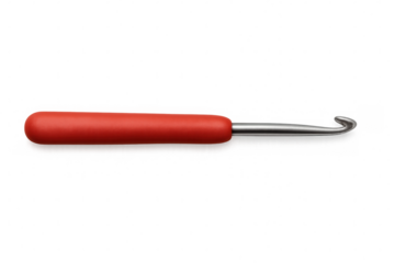 Close-up red crochet hook with metal tip lying horizontally, showcasing crafting tool against transparent background