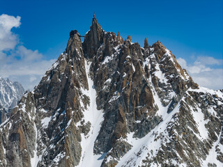 Aerial view of the Aiguille du Midi and the Mont Blanc Famous Alpine mountaineering and rock...