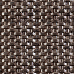 Seamless 4k photo texture material of synthetic brown leather surface with mesh embossing.
