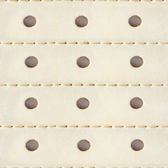 Seamless 4k photo texture material of beige colored leather surface with stitching and holes.