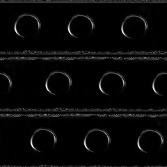 Seamless 4k photo texture material of balck colored leather with plastic buttons and stitches.