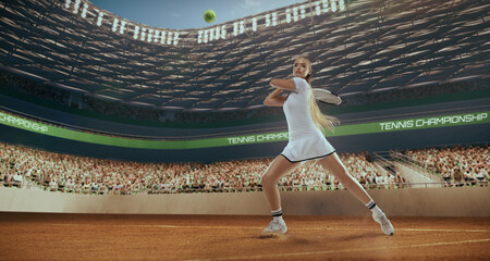 Woman tennis player playing tennis in professional tennis stadium.