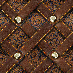 Seamless 4k photo texture material of brown suede leather with leather riveted mesh.