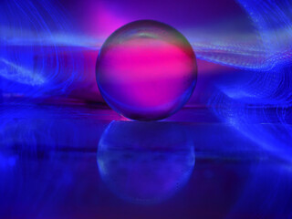 A clear glass ball is sitting on a pedestal. Colorful background. Abstract graphic background. Light effect. Planet in a space mood and feel.
