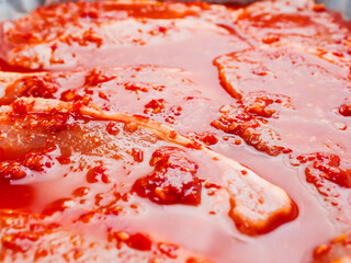 Fine pork chops in rich red juicy marinade. Raw meat product for cooking in many different way....