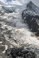 Aiguilles du Midi at the Mont Blanc in the French Alps surrounded by glacier Ice