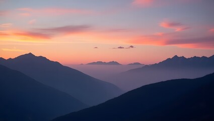 Fototapeta premium Serene sunset over silhouetted mountain ranges