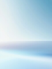 Obraz premium A Soft, Light Blue Gradient Background Ideal for Product Displays and Presentations, Featuring a Smooth Transition and Subtle Variations in Shade