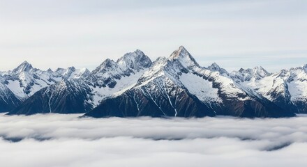 Obraz premium Snowcapped Mountain: Range Above Cloudscape Winter Landscape