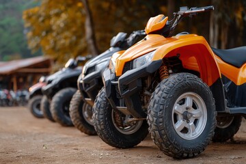 Aligned allterrain vehicles ATVs show off different colors and tire textures in a clear detailed outdoor shot
