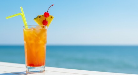 Refreshing Orange Cocktail with Pineapple and Cherries by the Ocean