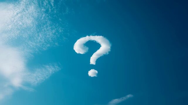 Shifting cloud question mark against bright blue sky