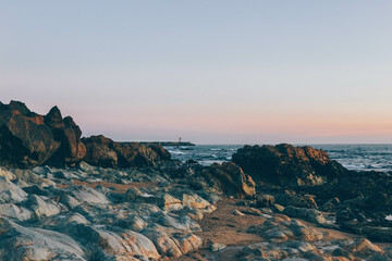 sunset over the ocean with beautiful pink light with clear sky