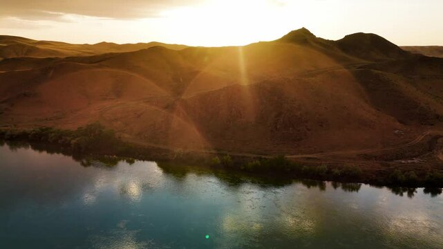 Drone shot of river Ili and spring steppe in Kazakhstan