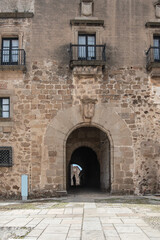 Passageway with a semicircular arch and coat of arms of the palace of the Marquises of Mirabel in Plasencia, province of Cáceres, Spain