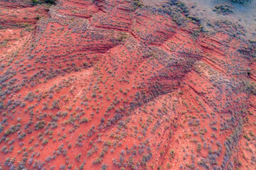 dusk over rugged foothills of Rocky Mountains in northern Colorado with red sandstone and canyons,...