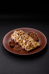 Christmas Stollen, a German sweet cake with marzipan and fruit. Winter Christmas Stollen