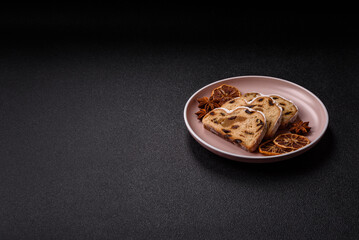 Christmas Stollen, a German sweet cake with marzipan and fruit. Winter Christmas Stollen