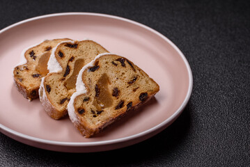 Christmas Stollen, a German sweet cake with marzipan and fruit. Winter Christmas Stollen