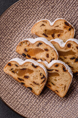 Christmas Stollen, a German sweet cake with marzipan and fruit. Winter Christmas Stollen
