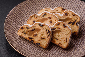Christmas Stollen, a German sweet cake with marzipan and fruit. Winter Christmas Stollen