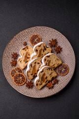 Christmas Stollen, a German sweet cake with marzipan and fruit. Winter Christmas Stollen