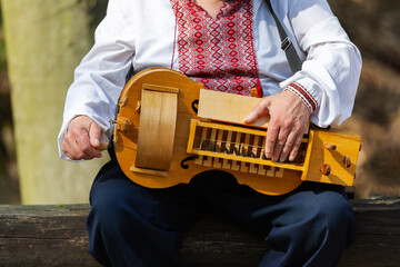 The wheel lyre or relya is an ancient stringed bowed musical instrument in which the role of the bow is performed by a wheel. Structurally similar to the hurdy-gurdy.