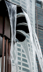 Fountain or water feature detail Sydney Australia, water streaming off of a petal shaped spout_20101217_05098